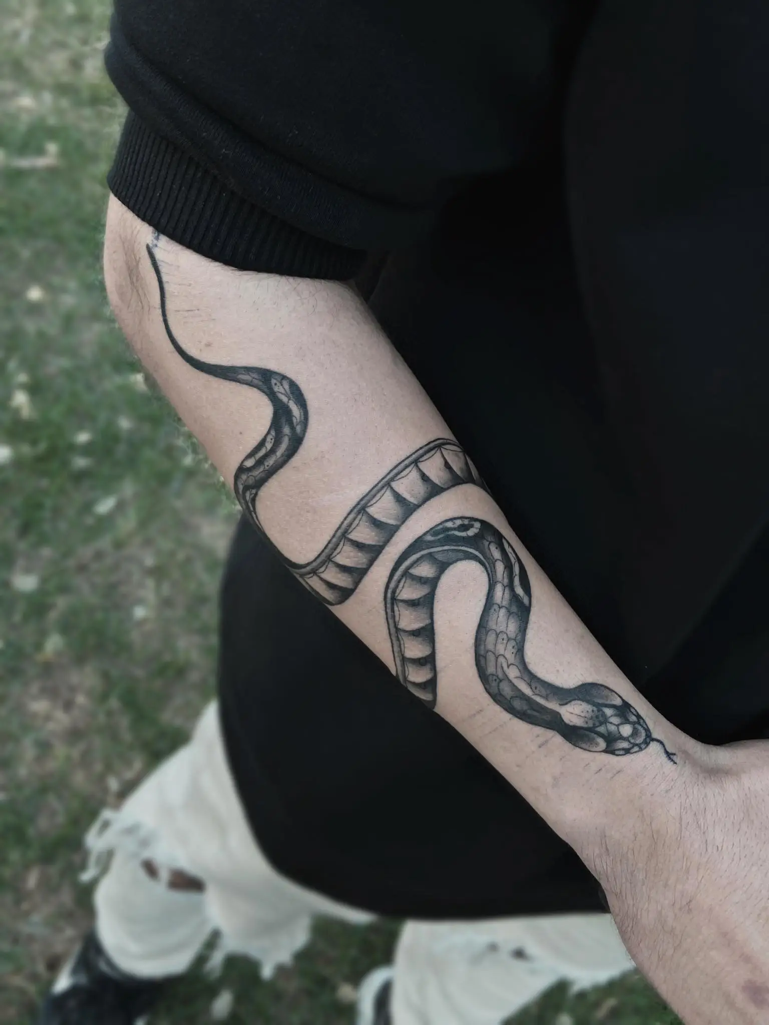 un tatuaje de serpiente